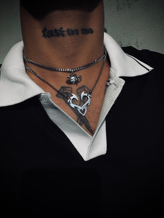 Top Planet necklace & bottom Thorn Heart necklace