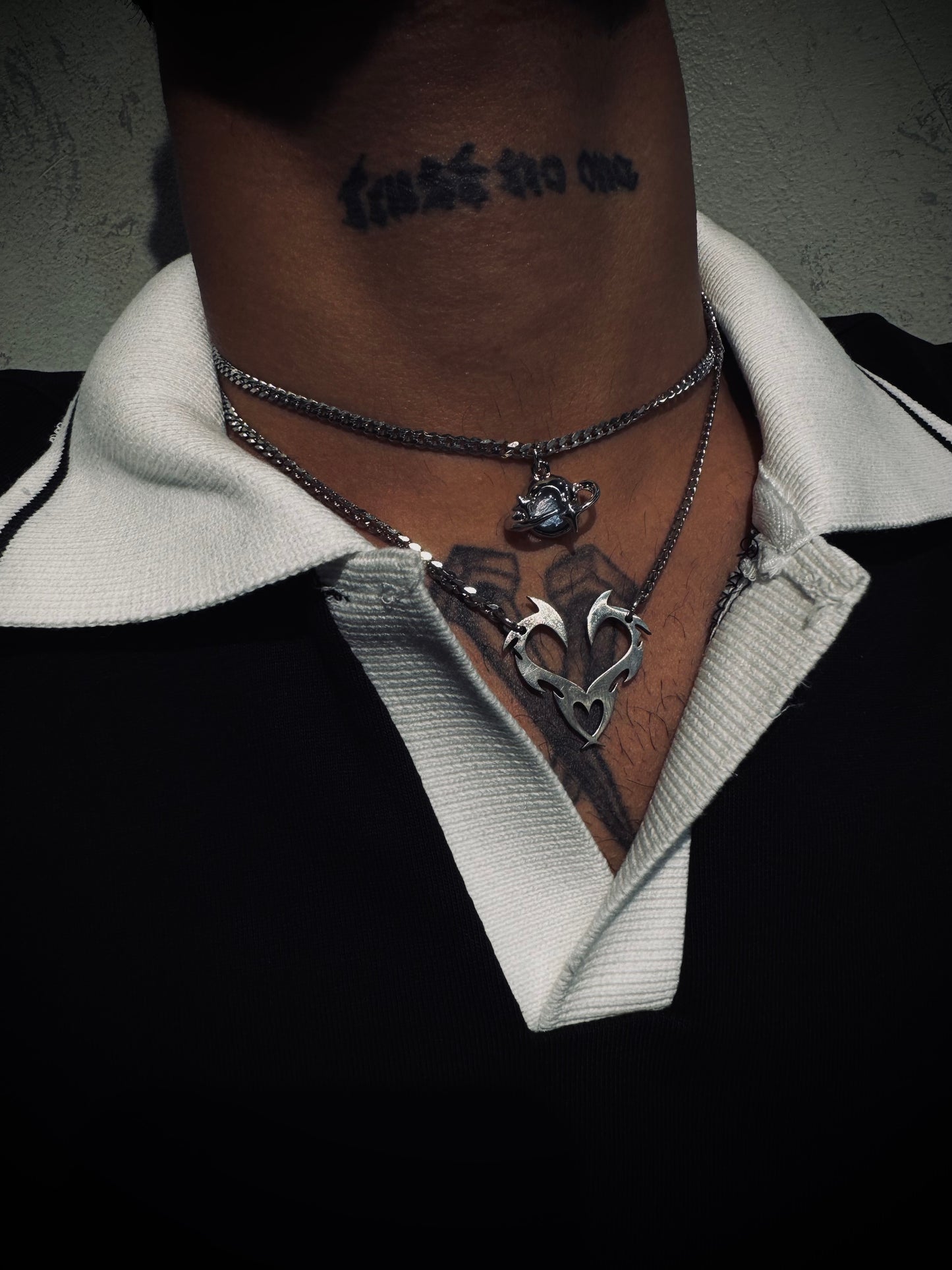 Top Planet necklace & bottom Thorn Heart necklace